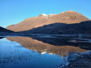 View of Liathach from Ling Hut with a perfect reflection on the lake