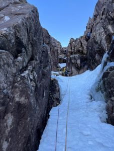 Seb climbing George in Liathach
