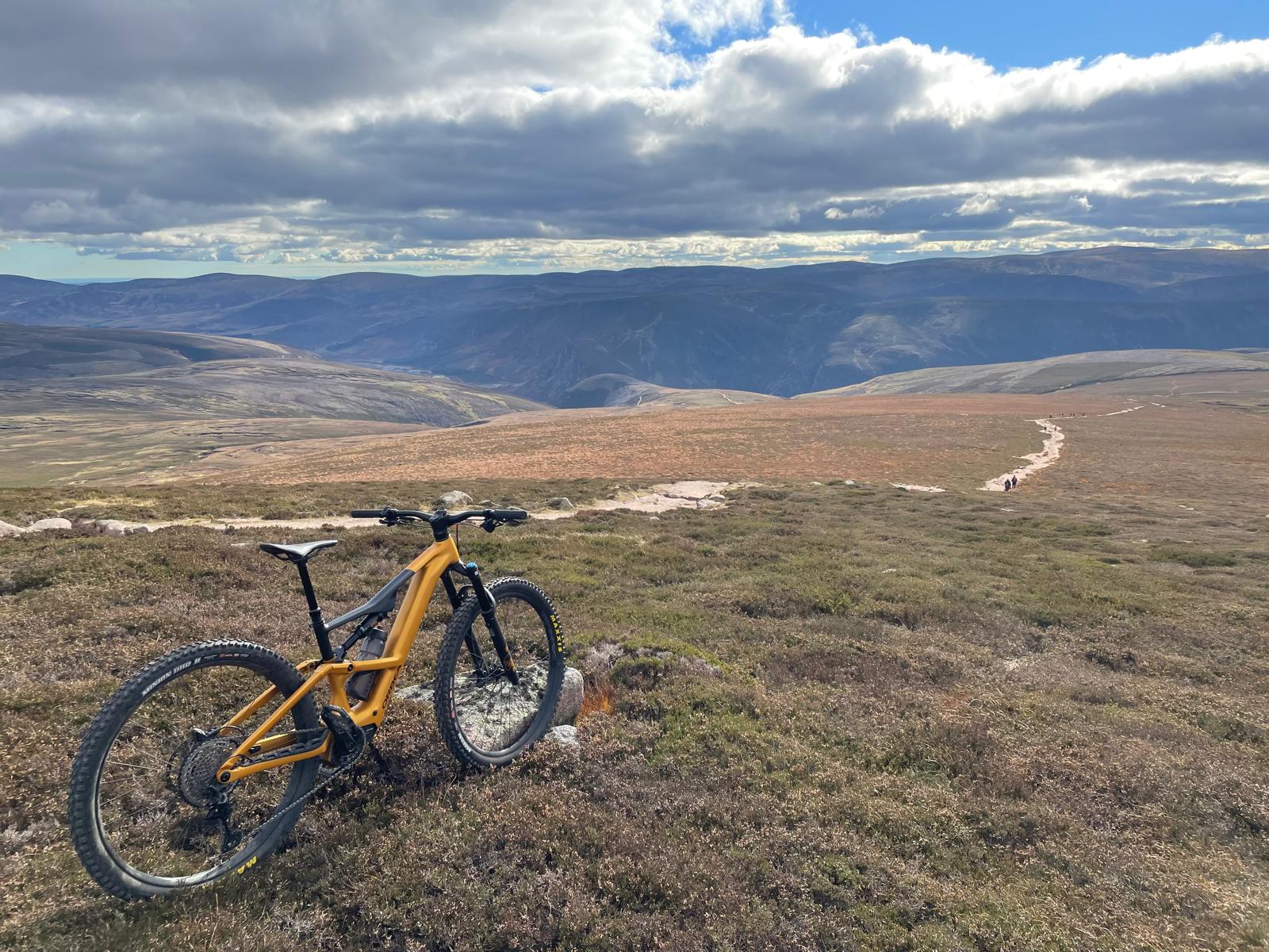 Neil's E Orbea on top of Mount Keen
